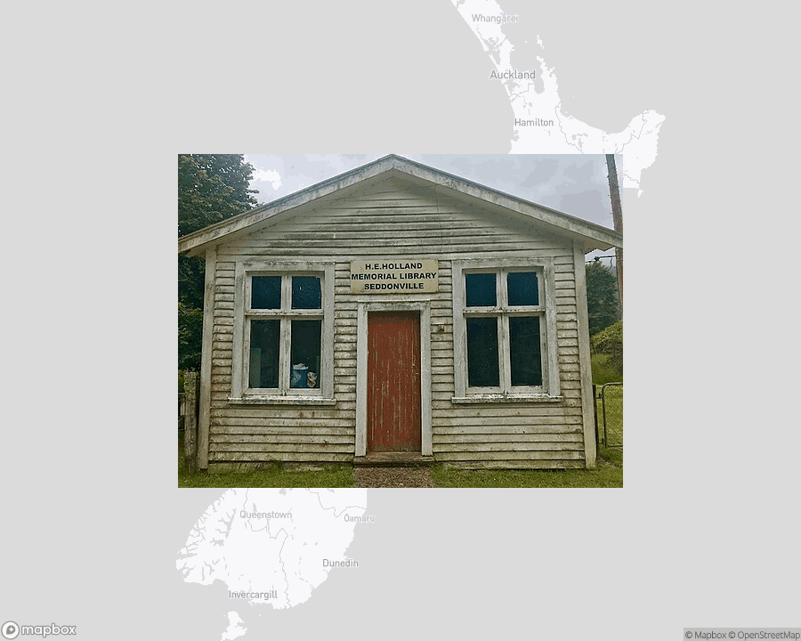 A photo of or from a library from the linked website, overlaid on a cropped world map where it's located.