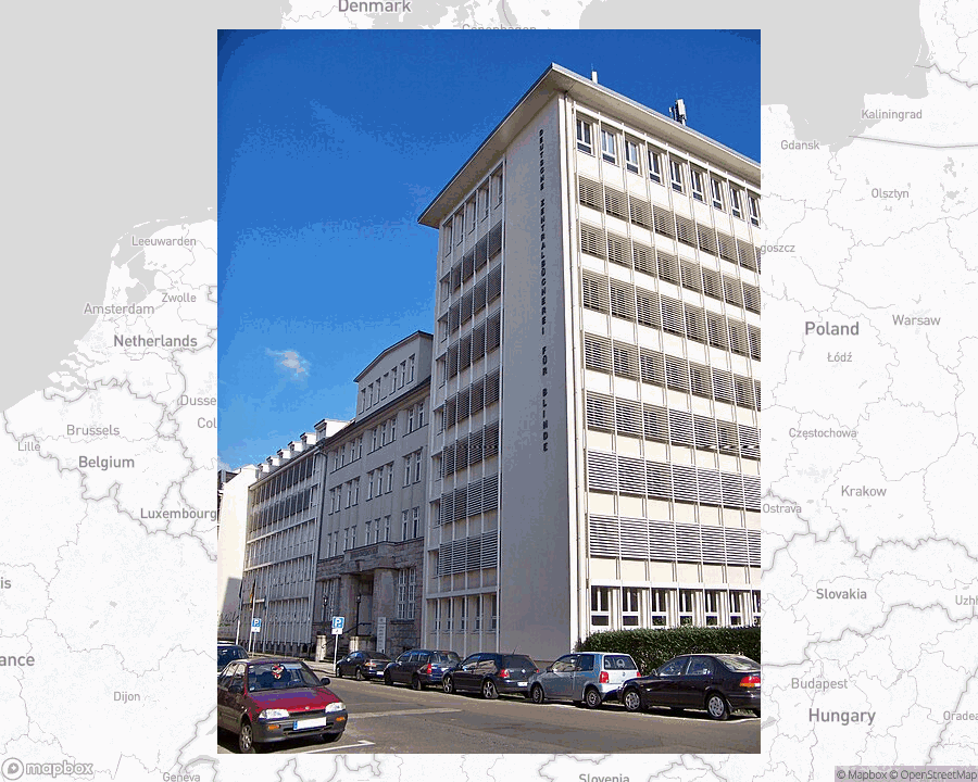 A photo of or from a library from the linked website, overlaid on a cropped world map where it's located.