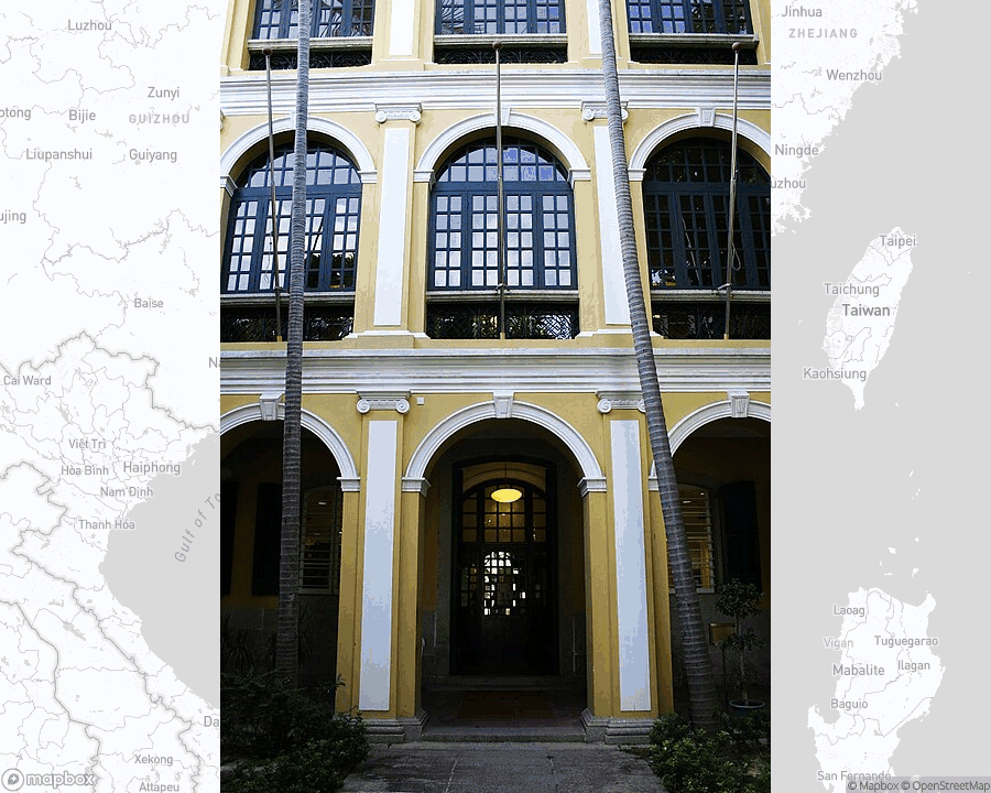 A photo of or from a library from the linked website, overlaid on a cropped world map where it's located.