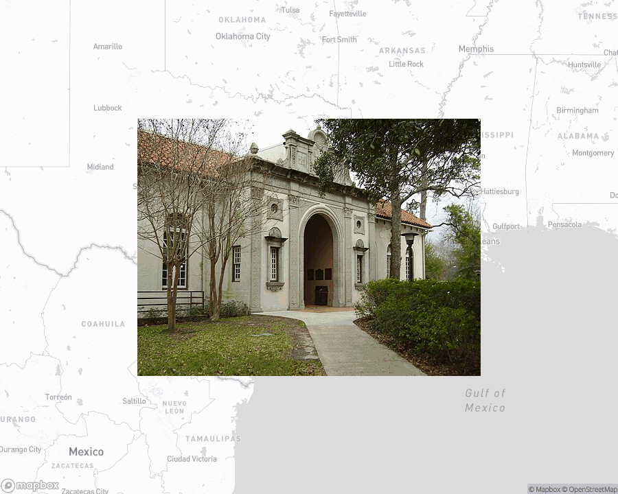 A photo of or from a library from the linked website, overlaid on a cropped world map where it's located.